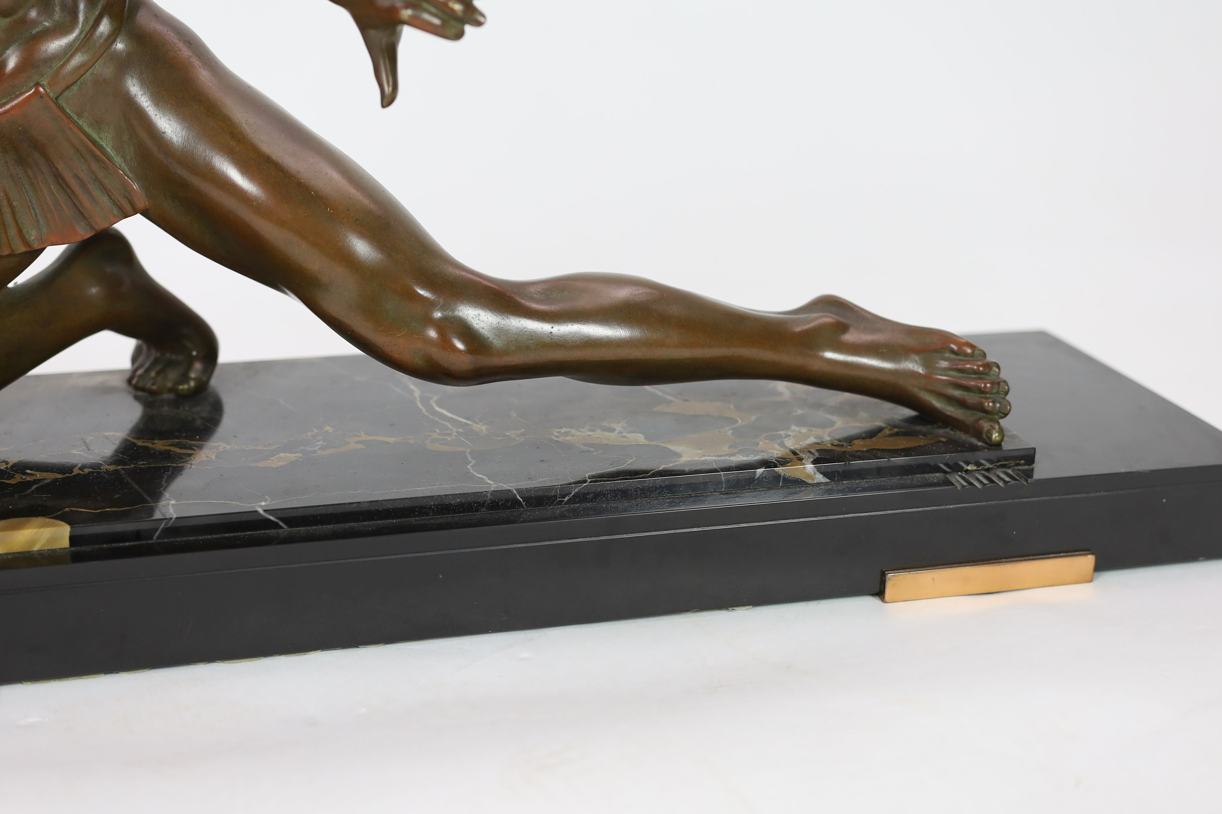 Pierre Joseph Hugonnet. A 1930s French Art Deco bronze model of a spear thrower, length 90cm, height 38cm